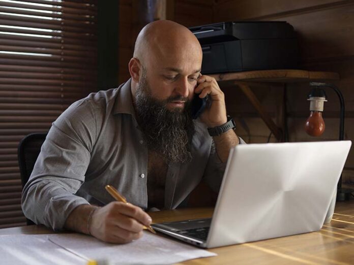 South African SME owner reviewing finances amid declining SME confidence in improving economy